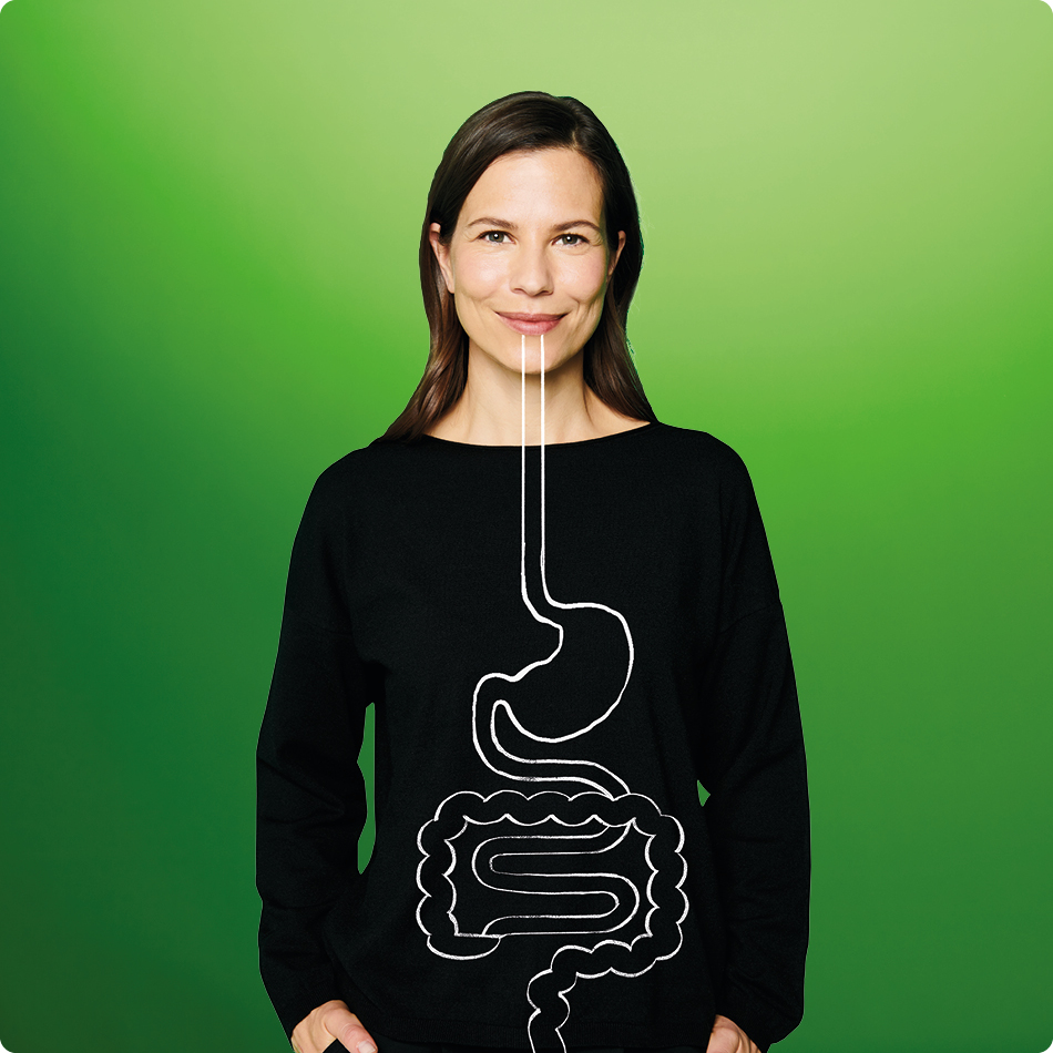 Frau mit aufgezeichneter Infografik des Verdauungssystems